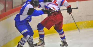 two hockey players fighting