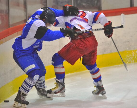 two hockey players fighting
