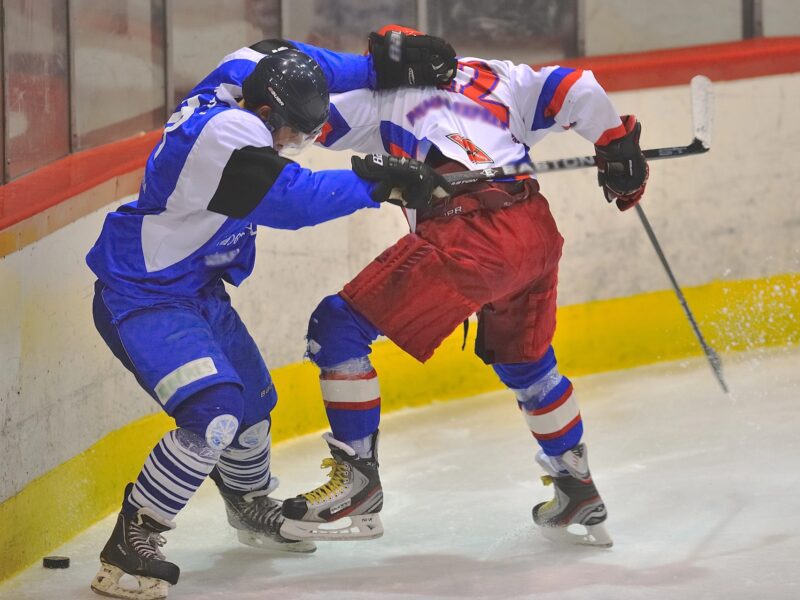 two hockey players fighting
