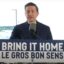 Pierre Poilievre standing at a lectern behind a sign that says "Bring It Home/Le Gros Bon Sens"