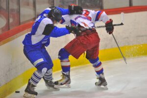 two hockey players fighting
